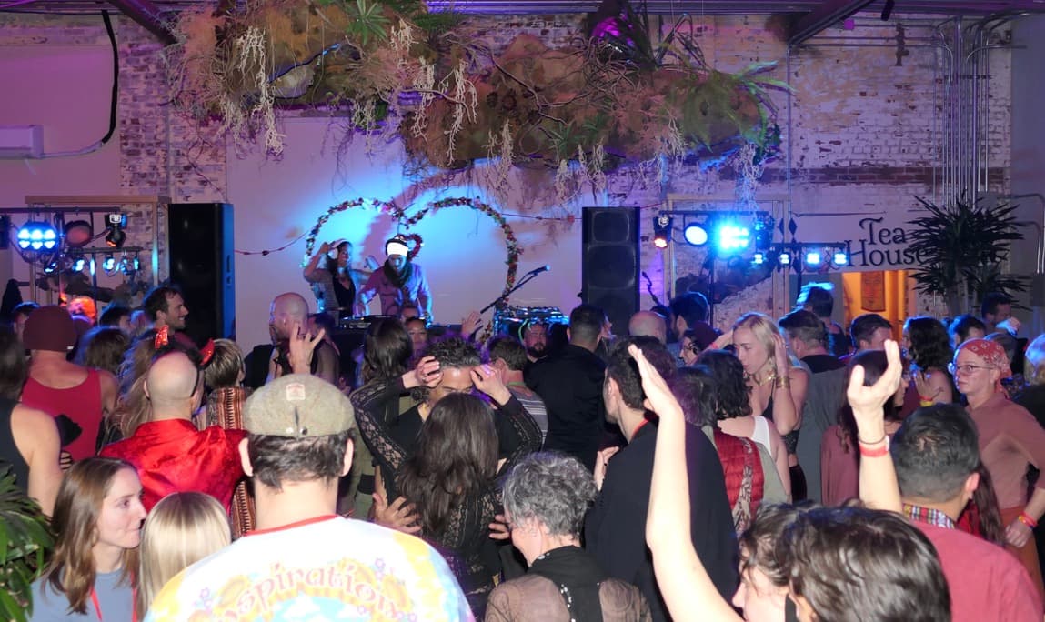 A vibrant community gathering with tea house ambiance